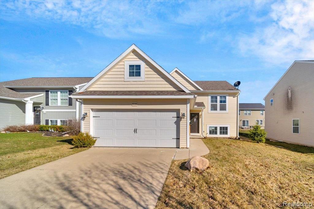 8598 Pinnebog River Drive , Fowlerville, Michigan image 1