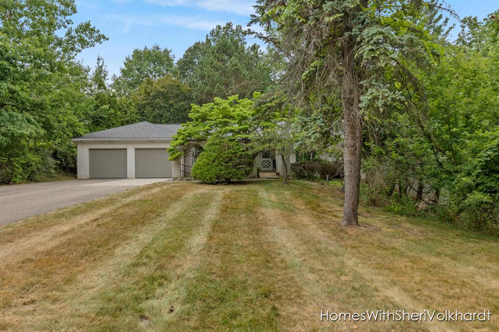 303 4 Mile Road Nw, Comstock Park, Michigan image 1