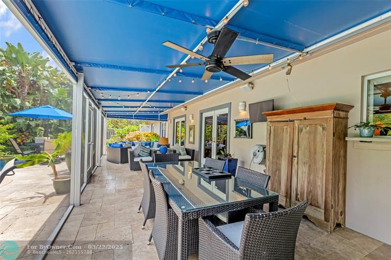 Outdoor Dining and Living in screened room.