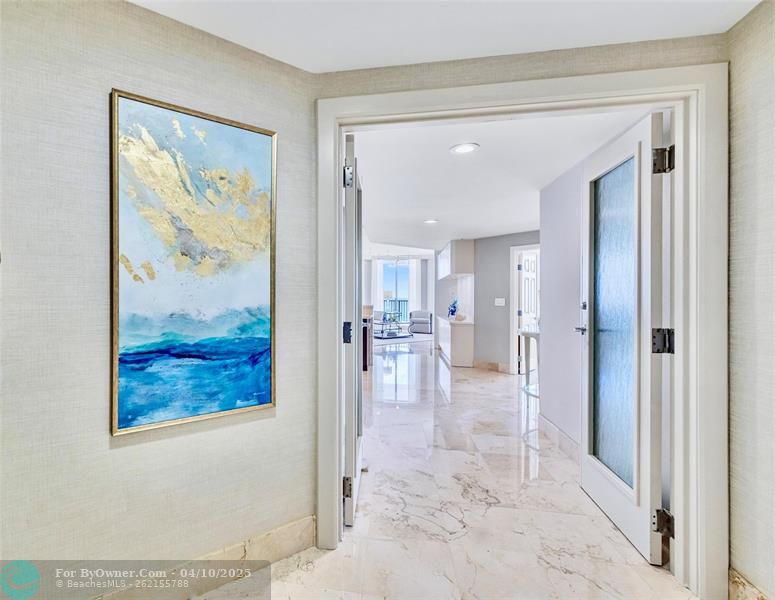 Direct elevator access from both the lobby and garage, which opens into your private foyer through stylish glass entry doors.