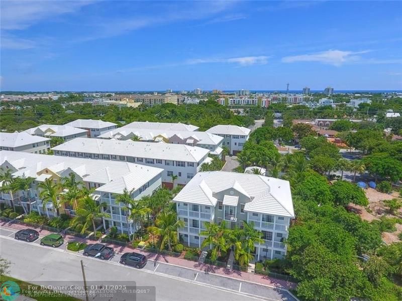 AERIAL VIEW OF CODA COMMUNITY SHOWING ATLANTIC OCEAN LESS THAN 1.5 MILES FROM THE TOWNHOMES.
