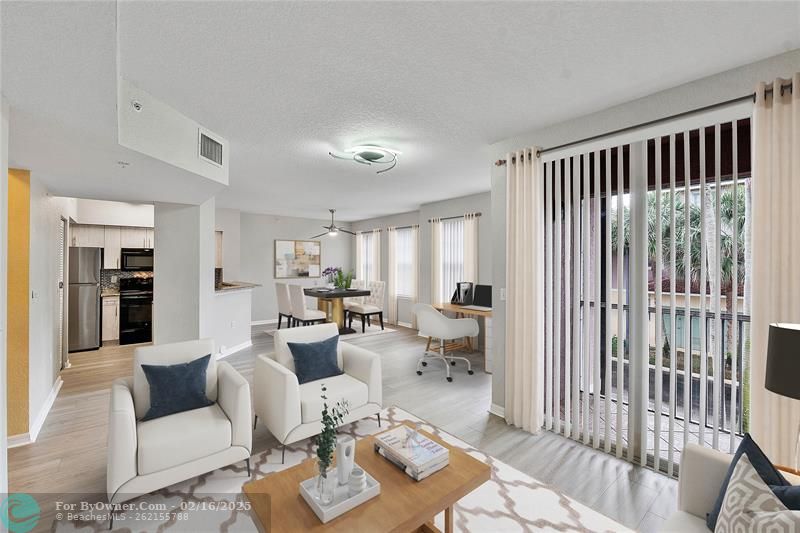Staged family/dining/office area