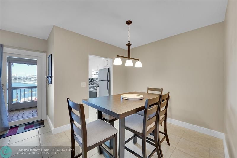FABULOUS WATER VIEWS from every angle. Easy Access to the Kitchen & SCREENED-IN BALCONY. Picture Yourself Enjoying Meals & Creating Memories with Family & Friends in your New Home with those WATER VIEWS!
