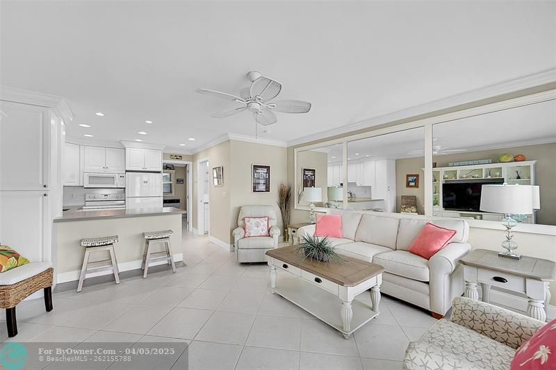 Your 2nd Floor Condo HAS NO ONE ABOVE YOU, is OVERLOOKING THE POOL, HAS AMAZING VIEWS INCLUDING INTRACOASTAL from inside your Condo or your OPEN BALCONY. You have to see how Quiet, Bright, Open and Inviting this unit is with these HUGE IMPACT WINDOWS AND DOOR and Open Floor Plan. BEING SOLD FURNISHED (some exclusions) so you could just bring your Clothes and Toothbrush to CALL IT HOME!