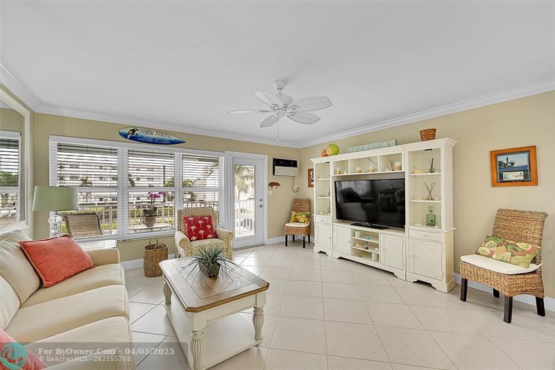 You have to see how Quiet, Bright, Open and Inviting this unit is with these HUGE IMPACT WINDOWS AND DOOR and Open Floor Plan. BEING SOLD FURNISHED (some exclusions) so you could just bring your Clothes and Toothbrush to CALL IT HOME! Your 2nd Floor Condo HAS NO ONE ABOVE YOU, is OVERLOOKING THE POOL, HAS AMAZING VIEWS INCLUDING INTRACOASTAL from inside your Condo or your OPEN BALCONY.