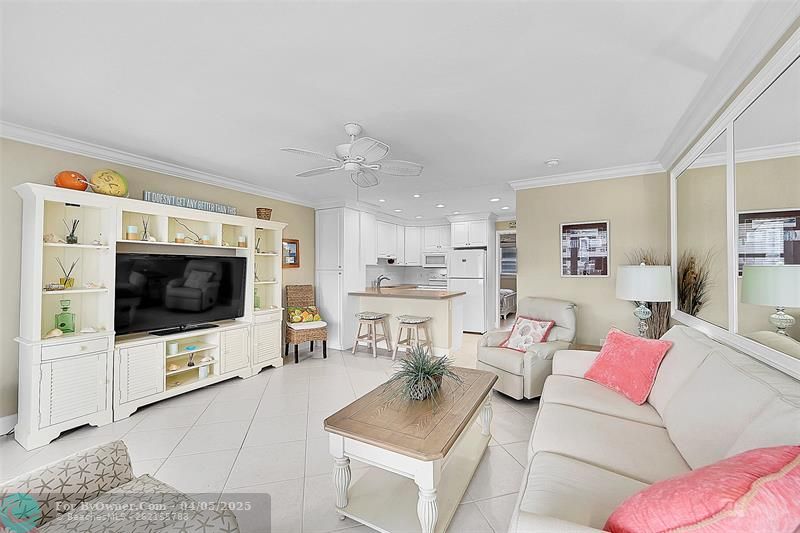 Your 2nd Floor Condo HAS NO ONE ABOVE YOU, is OVERLOOKING THE POOL, HAS AMAZING VIEWS INCLUDING INTRACOASTAL from inside your Condo or your OPEN BALCONY. You have to see how Quiet, Bright, Open and Inviting this unit is with these HUGE IMPACT WINDOWS AND DOOR and Open Floor Plan. BEING SOLD FURNISHED so you could just bring your Clothes and Toothbrush to CALL IT HOME!