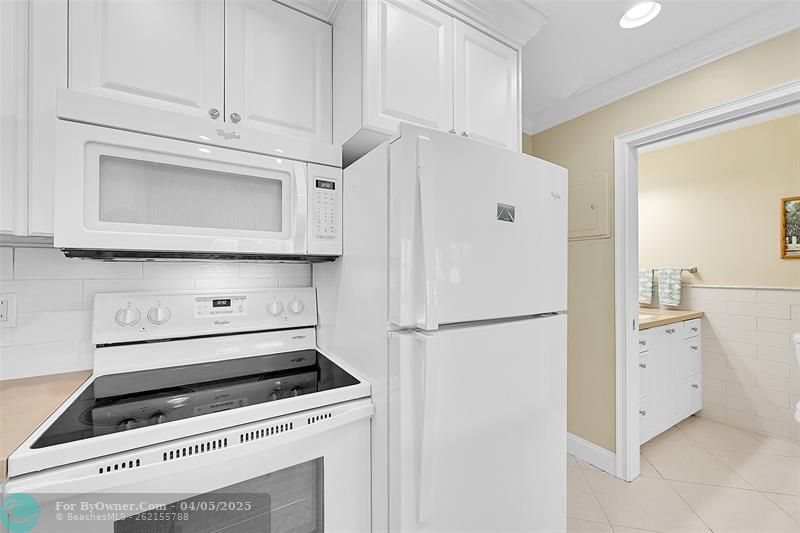 Bedroom and Bathroom just off the Kitchen. Updated Kitchen with Beautiful Cabinets, Stylish Countertops, White Whirlpool Appliances, Large White Subway Tile Backsplash, 18\