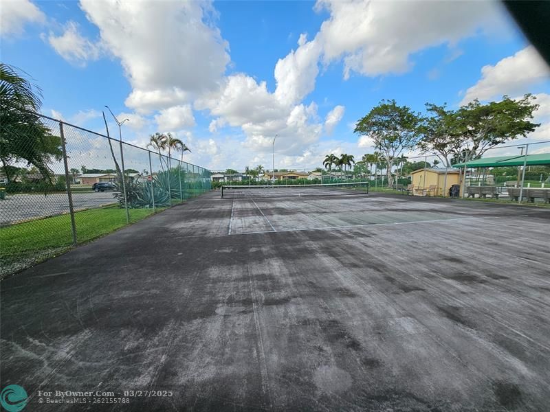 TENNIS COURTS STEPS FROM YOUR FRONT DOOR