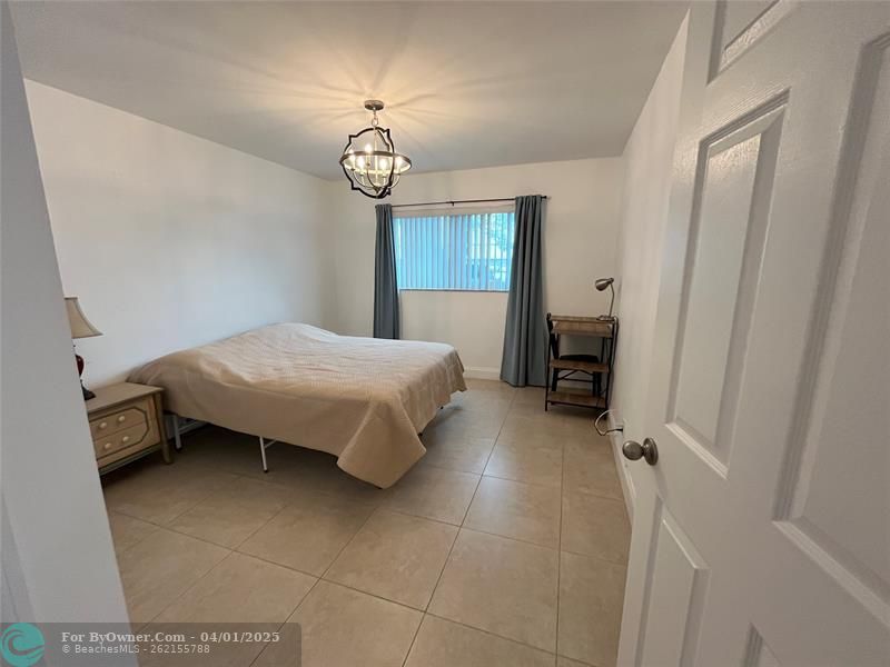 Primary bedroom with en-suite bathroom