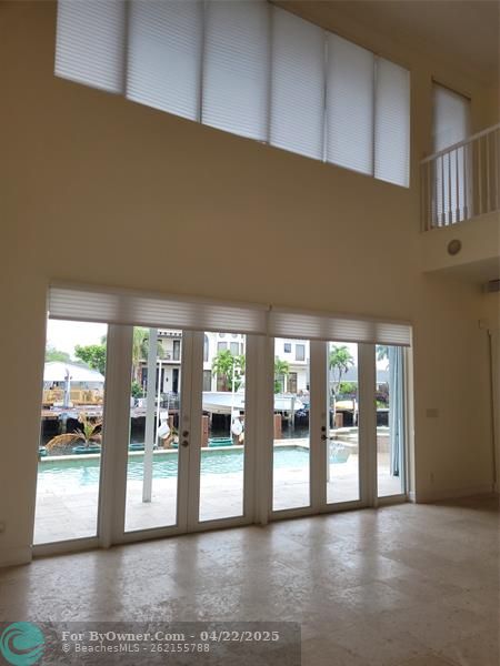 VIEW FROM LIVING AREAS INTO KITCHEN AREAS/OFFICE/ CUSTOM WALL UNITS