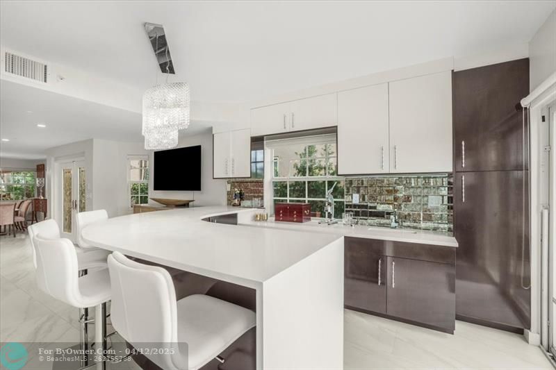 Handcrafted Custom Wet Bar With Swarovski Crystal Light Fixture. Cozy Up To The Bar With Friends