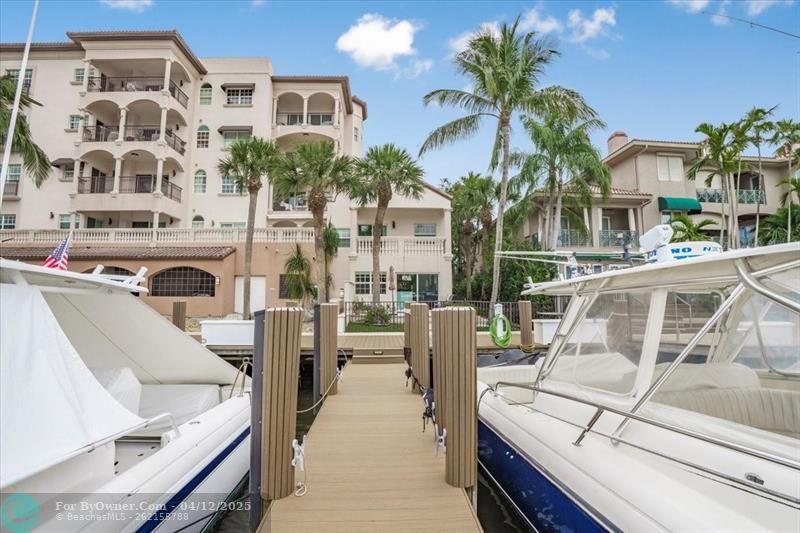 Here is Your Deeded Dock! Right Outside Your Gated Back Patio. No Fixed Bridges.