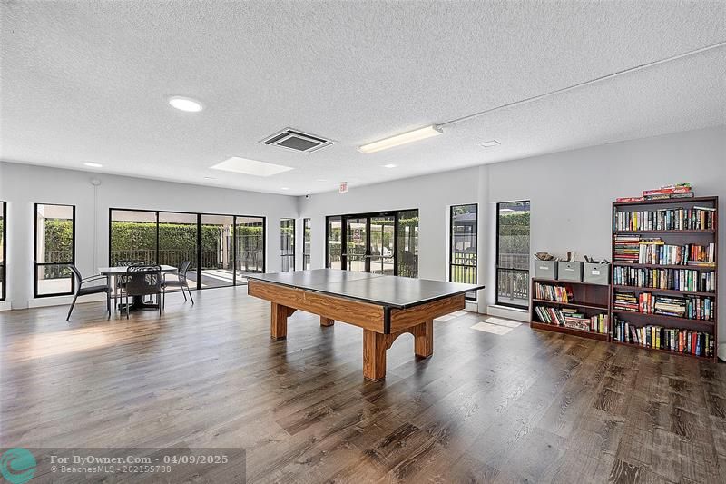 Play ping ping or billiards, or read a book by the pool at the clubhouse in Hidden Woods