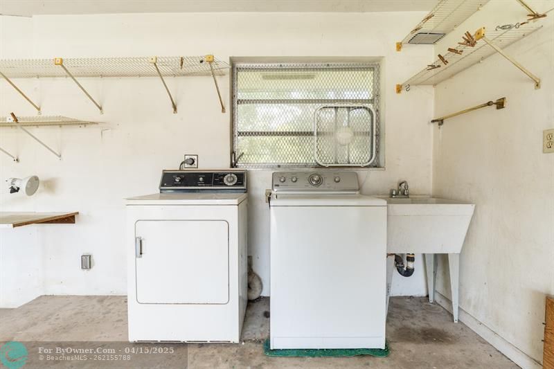 Washer & dryer currently located in the garage.