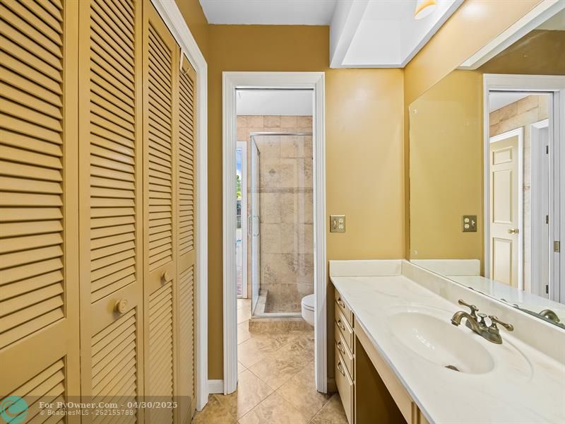 Primary bathroom offers dual sinks with walk-in closet and a bonus closet.  Plenty of space for your daily routine