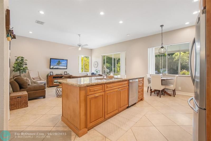 Open kitchen and family room with high ceilings