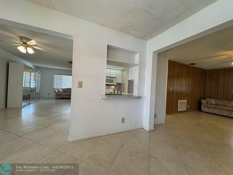 PASS THROUGH KITCHEN TO FAMILY ROOM