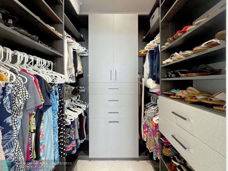 Ample Space in Multiple Custom Fitted Closets