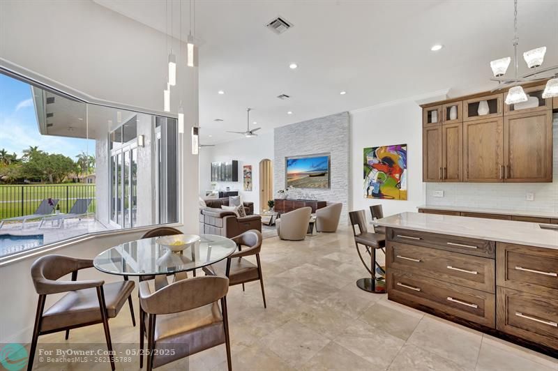 Relish in the stunning views through the seamless glass windows; modern designer lighting.