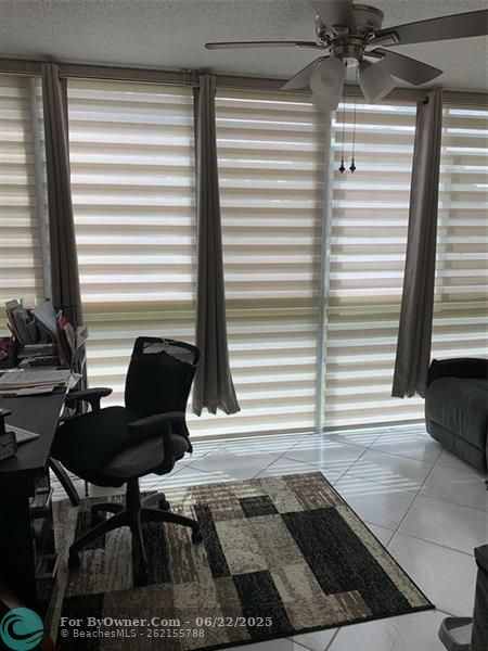 Beautiful Custom Hurricane Proof Wall Of Windows in the Sunroom.