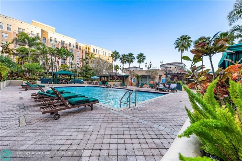 Gorgeous community spaces with seating, lush landscaping, water features & grills