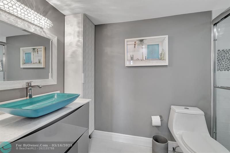 2nd full bathroom with Italian cabinetry and large shower