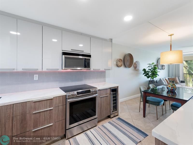 Quartz Counter Tops-Stainless Steel Appliances-Notice the Wine Cooler