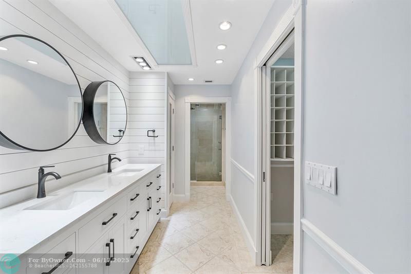 Fully remodeled primary bathroom with walk in closet