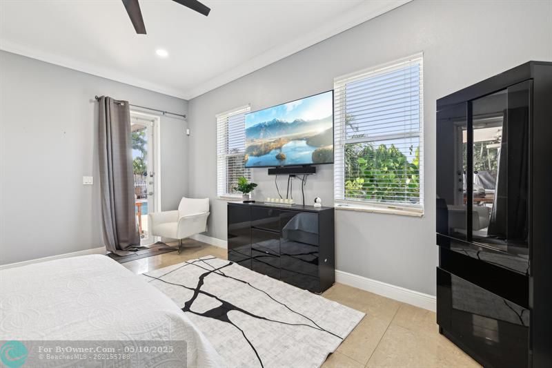 First-Floor Junior Primary Suite – offers a private entrance, a beautifully designed en-suite bathroom, and spacious custom closets, providing the perfect blend of comfort, privacy, and functionality.
