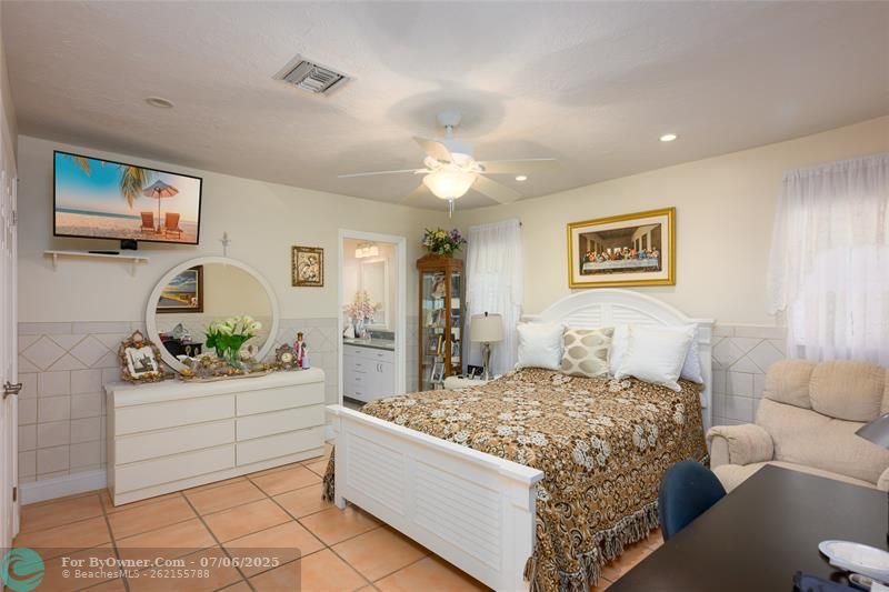 Master bedroom has double walk in closets