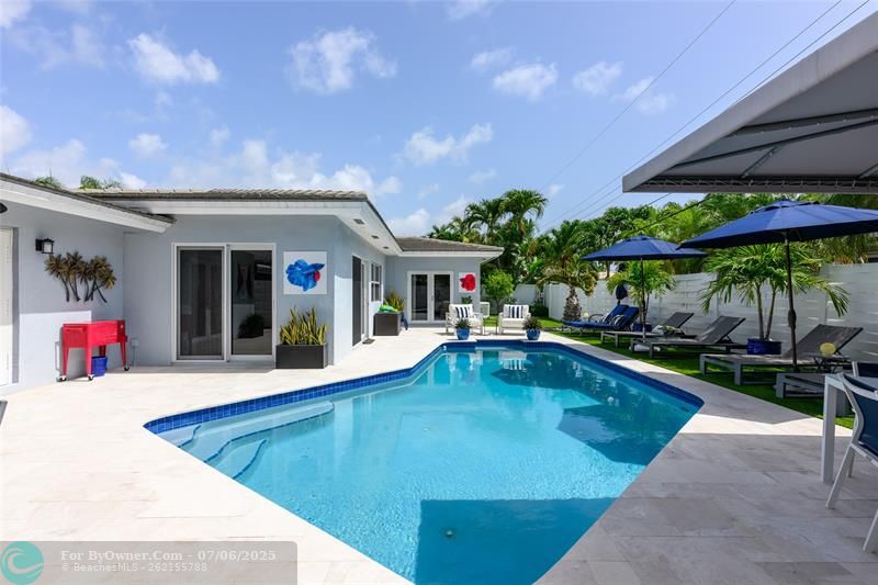 Saltwater pool and marble pool deck