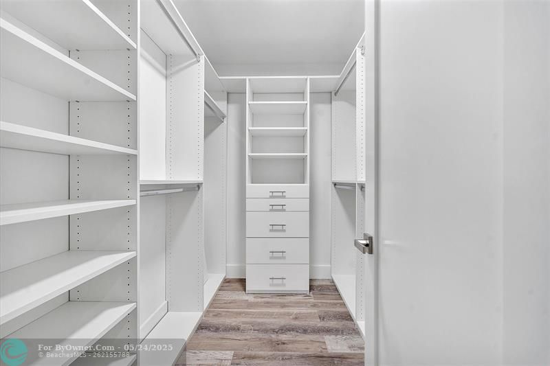 WALK-IN CLOSET OFF THE MASTER BEDROOM