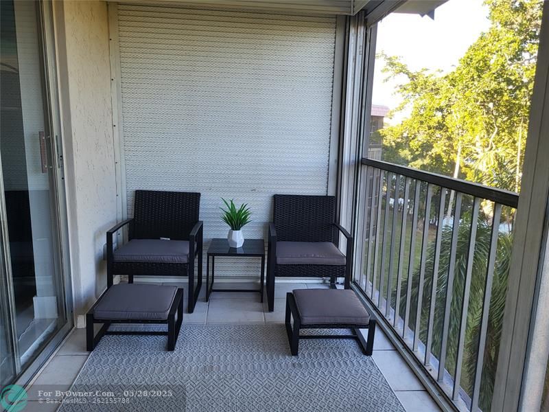 Large screened baclony with storm shutters