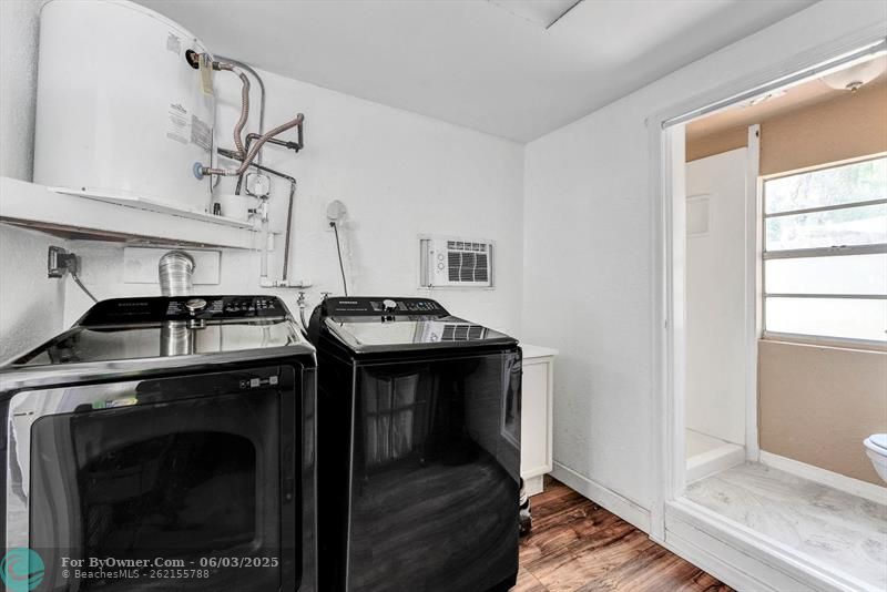 Separate laundry and 3rd bathroom.