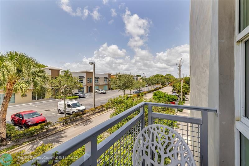 WRAP-AROUND BALCONY WITH EXPANSIVE EAST VIEWS.