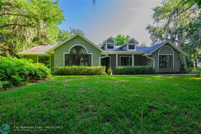 Tucked away on a quiet cul-de-sac, this beautifully updated 3-bedroom, 2-bathroom pool home with a large office featuring glass French doors sits on a rare ½-acre lot in the established River Hammock neighborhood—offering a hard-to-find combination of space, privacy, and flexibility with no HOA.