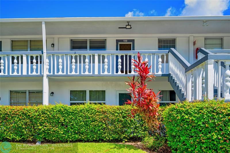 Charming second story unit with convenient stair access nearby.