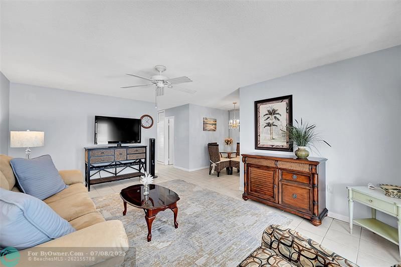 Bright, Open, Spacious and Ready for You and Your Family and Friends to Enjoy! Your Furnished Living Room includes a Queen Sized Sofa Bed, Impact Windows and Doors with Blinds and Retractable Screen Doors!