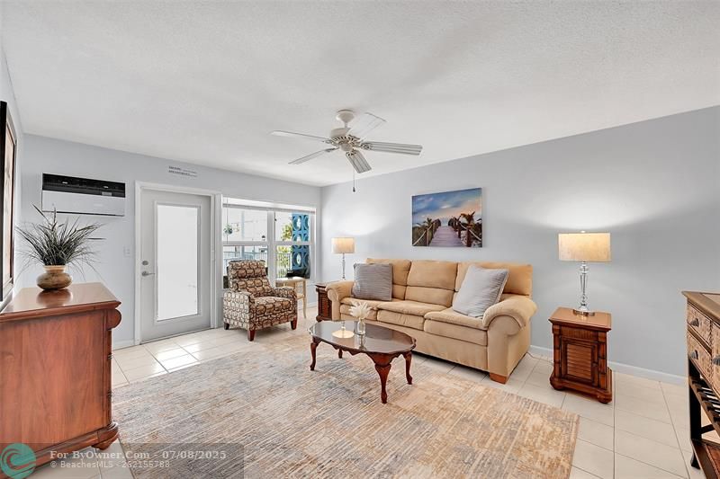 Being Sold Furnished, Turn-Key. Impact Windows & Doors also include Blinds and Retractable Screen Doors! Your Living Room, Dining Area are Bright, Spacious and Great for Quiet Times or Entertaining!