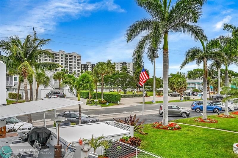 Pool, Sunset & Garden Views from Your Living Room & Oversized Balcony. You can\'t beat the location & conveniences so close by!