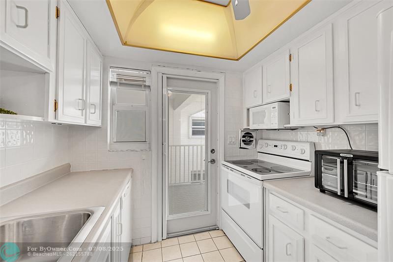 Your Kitchen Features lots of Cupboard and Cabinet Space, is Bright & Has A Door to Your Balcony! Being Sold Furnished, Turn-Key. Impact Windows & Doors also include Blinds and Retractable Screen Doors!