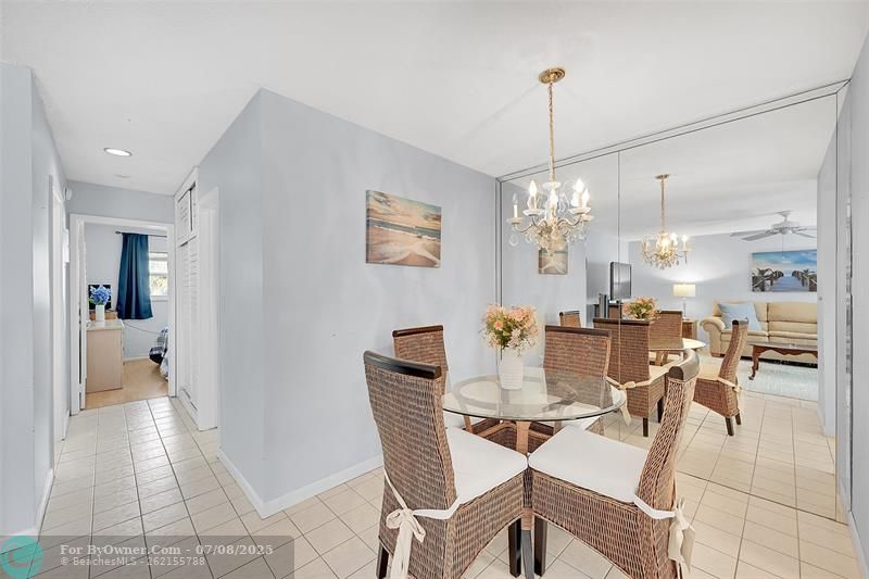 Big Custom Mirror in Your Dining Area. From Your Living Room and Dining Area is the Bathroom and Both Bedrooms. Being Sold Furnished and Turn-Key!