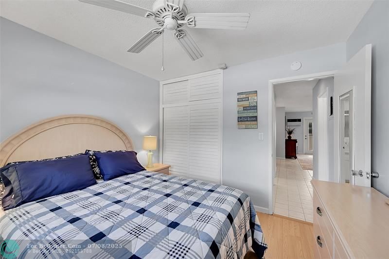 Guest Bedroom has Floor to Ceiling Closet Space with Seasonal Closet Storage at the Top. Bathroom is right outside the Bedroom.