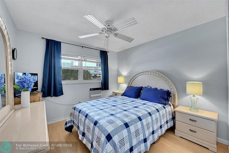 Your Furnished Guest Bedroom Includes This Queen Sized Bedroom Furniture. Wake up to Amazing Sunrises! Includes Impact Windows & Blinds, So Quiet!