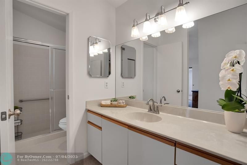 PLENTY OF STORAGE SPACE IN THE BATHROOM