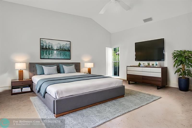 FIRST MASTER BEDROOM WITH LOTS OF NATURAL LIGHT. FURNITURE IS VIRTUALLY STAGED