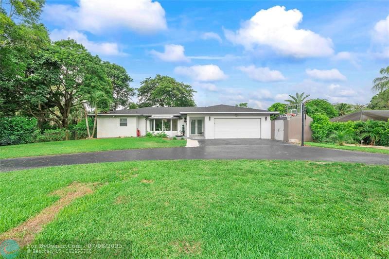 5939 NW 79th Way, Parkland, Florida image 1