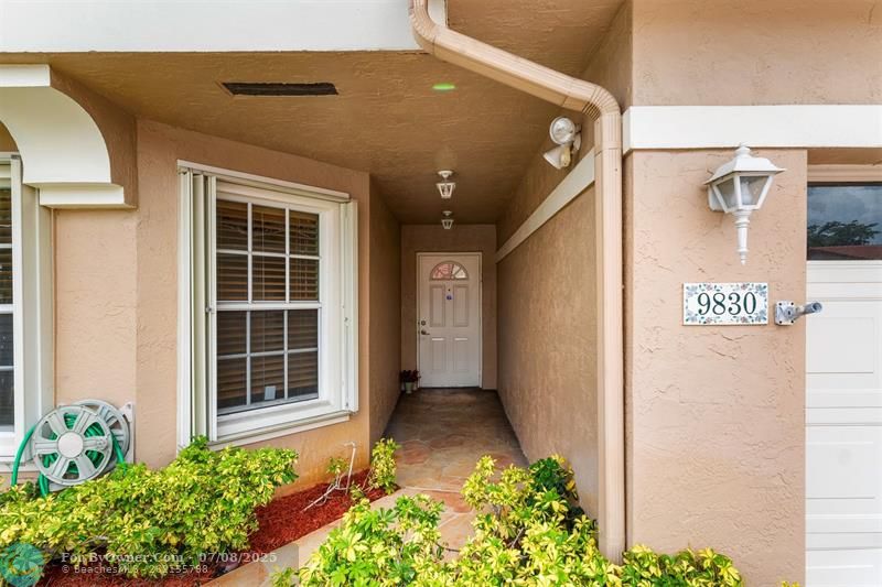 Private entry with attached garage!