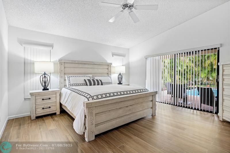 Light, bright Primary bedroom with upscale laminate flooring!